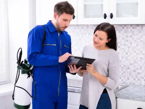 Pest Control Worker Showing Invoice To tenant